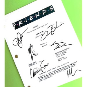 May include: A white script for the television show "Friends" with the episode title "The One Where Ross Finds Out" and the date September 28, 1995. The script is signed by the cast members, including Jennifer Aniston, Matt LeBlanc, Courteney Cox, Lisa Kudrow, David Schwimmer, and Matthew Perry.