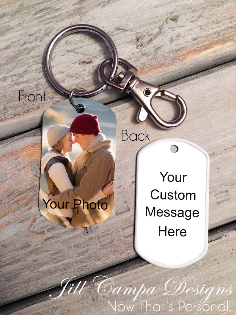 May include: A personalized metal keychain with a photo on the front and space for a custom message on the back. The front displays a couple embracing, with the text "Your Photo". The back has the text "Your Custom Message Here".