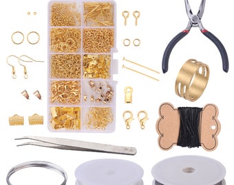 May include: A gold jewelry making kit with a variety of beads, clasps, and other findings. The kit also includes two spools of wire, a pair of pliers, and a pair of tweezers.