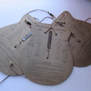 Ajustador de prendas sin alfileres patentado de 1935 vintage Exhibición de ropa Exhibición de tiendas Suministros de moda Exhibición de tiendas generales de tallas para niños