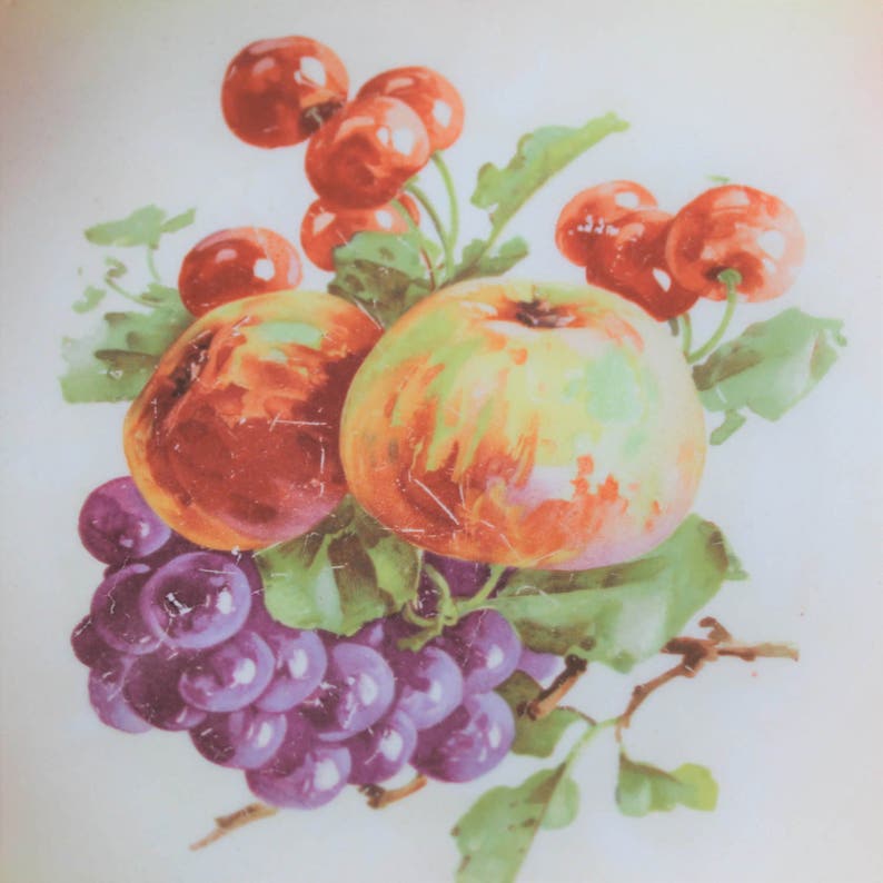 China 076 apples W.E.B cottage d\u00e9cor Vintage cottage chic china plates and grapes on pink and yellow background Co cherries