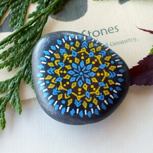 Medium Hand Painted Alchemy Stone with Blue, Yellow & White Sacred Geometry Starburst Mandala Design