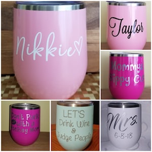 May include: Set of six stainless steel wine tumblers with various designs and text. The tumblers are pink, green, purple, and gray. The text on the tumblers includes "Nikki", "Taylor", "Mommy Sippy Cup", "Don't Puck with a Hockey Mom", "Let's Drink Wine & Judge People", and "Mrs. 6-8-18".