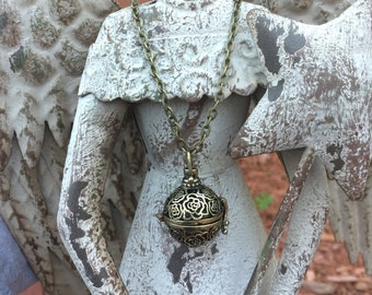 Floral Filigree Cremation Urn Necklace: Antique Bronze Cage Locket