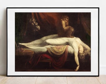 May include: A framed art print featuring a dark, dramatic oil painting of a figure in a white gown lying on a bed with a dark, demonic creature crouching on their chest. The scene is set in a dimly lit room with deep red drapery and shadows.
