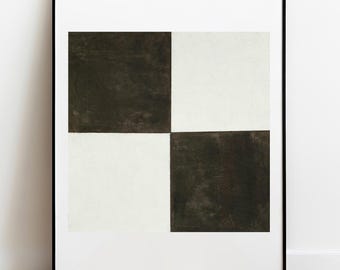 May include: A framed wall art print featuring a large square divided into four smaller quadrants. The top-left and bottom-right quadrants are solid dark charcoal, while the top-right and bottom-left quadrants are solid off-white, creating a checkerboard pattern.