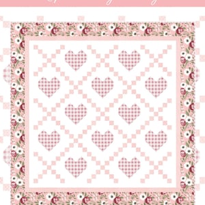 May include: A pink and white quilt pattern with a floral border and a central design of gingham hearts. The title "Hearts Delight" and the text "4 Sizes Included!" are printed below the quilt.