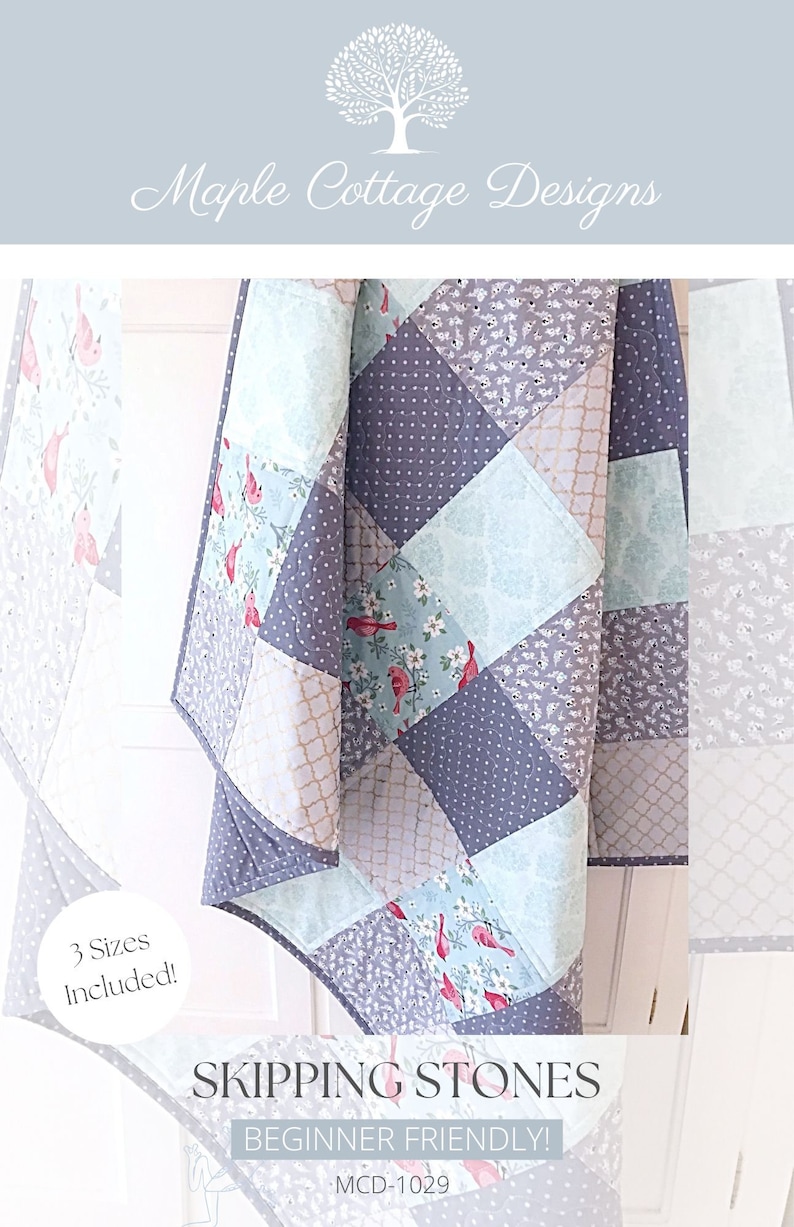 May include: A quilting pattern for a quilt called "Skipping Stones" with a beginner-friendly design. The quilt features a patchwork design with a variety of fabrics in shades of blue, gray, and white. The quilt is made up of squares and rectangles, and the pattern is easy to follow. The pattern includes instructions for three sizes of quilts. The pattern is called "MCD-1029".
