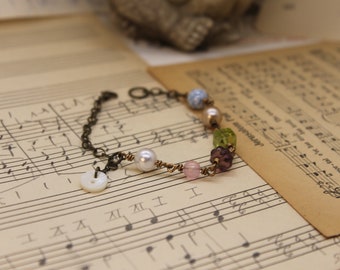 Small Biege Dangle button; Green Square Glass Bead, Blue Glass Bead Brass Bracelet