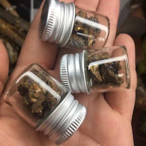 Assorted mini stone jars, jars of stones, rocks for rituals