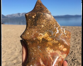 Huge ocean jasper flame, stone torch, carved stone, rocks and minerals