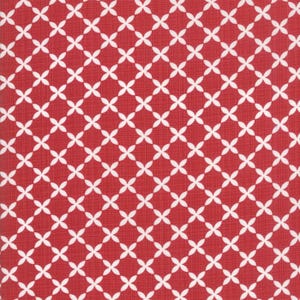 May include: Red fabric with a white floral pattern. The design features a repeating pattern of white four-petal flowers arranged in a grid across the red background. The fabric has a textured appearance.