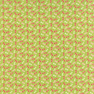 May include: A fabric with a repeating pattern of small bows in pink, red, and white on a light green background. The bows are evenly spaced and create a visually appealing design, suitable for various craft projects.