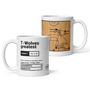 May include: White ceramic mug with a basketball court graphic and the text "T-Wolves greatest" on the front. The graphic shows a basketball play with player names and positions. The text "GARNETT 4Q 3:39" is also on the mug. The text "Western Conference Semifinals: Game 7 Target Center, 19 May 2004" is on the mug. The text "SACRAMENTO 80 MINNESOTA 83" is on the mug.