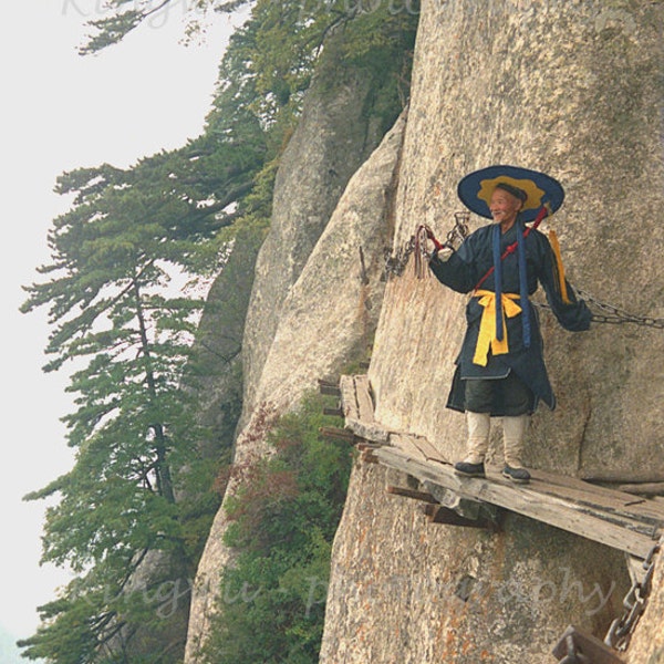 Chinese Monk walking along on mountain pathway, Portrait Film Photography, inspiration image.