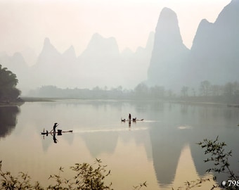 Fishermen on Li river, Guilin, Guangxi Province, China. Nature landscape outdoor photography