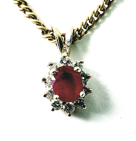 14k ruby & diamond halo pendant
