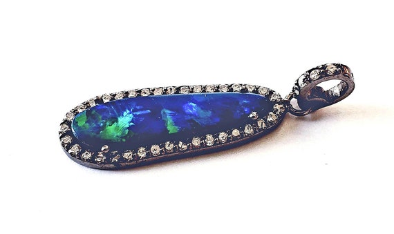 Boulder opal diamond pendant | diamond halo pendan