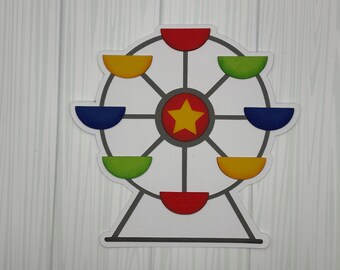 May include: A colorful Ferris wheel illustration with a white background. The wheel features red, yellow, green, and blue gondolas. The center has a red circle with a yellow star. The image is a fun, playful design.