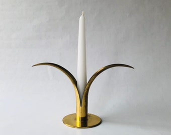 A beautiful vintage brass candlestick holder Lily/Liljan designed by Ivar Alenius Björk  for Ystad Metal