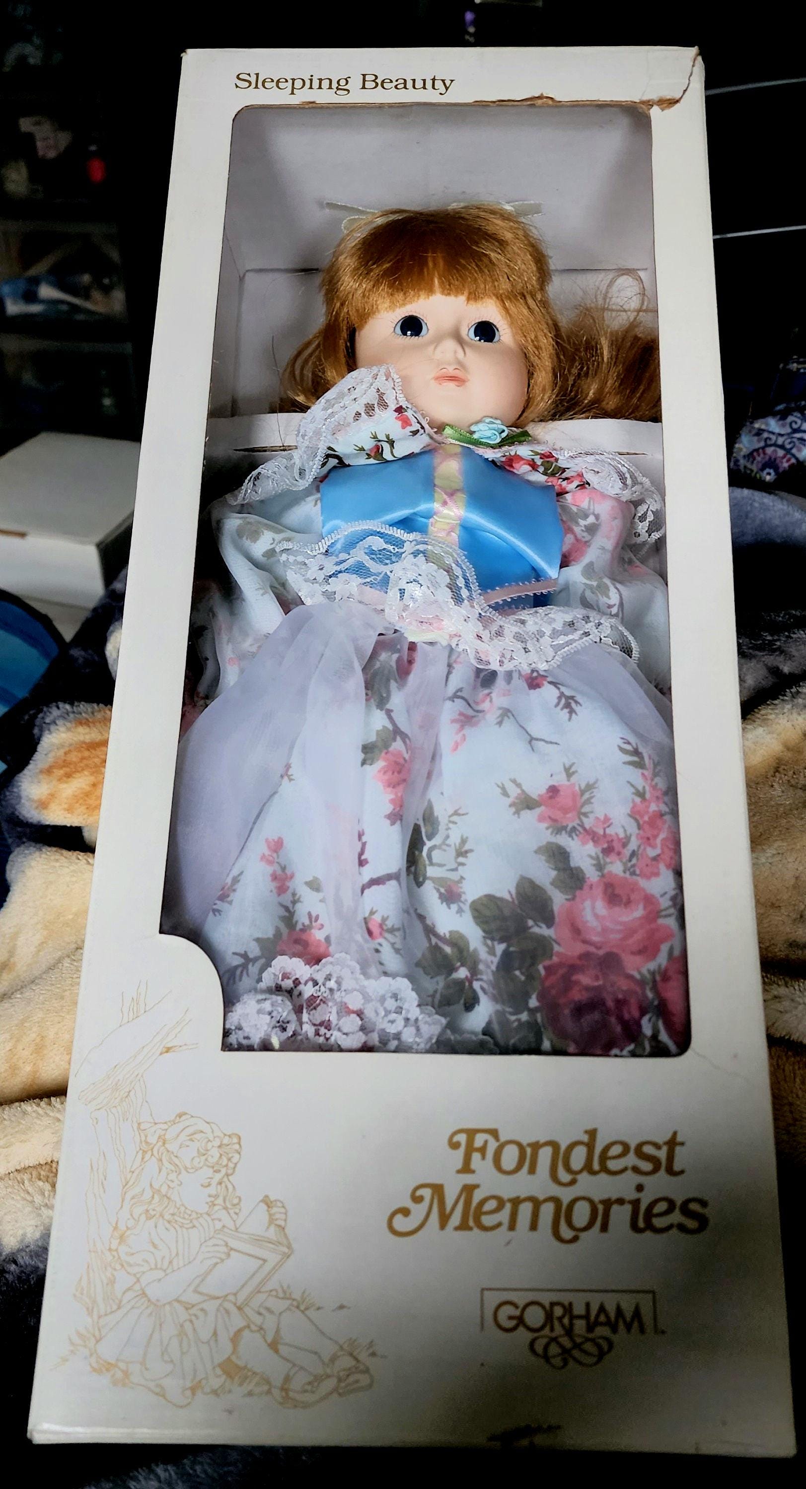 Sleeping beauty porcelain doll on sale