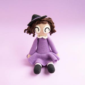 Cute crochet witch amigurumi PDF pattern, purple Halloween spooky toy, colorful kids room decor, beginner-friendly project, English US terms