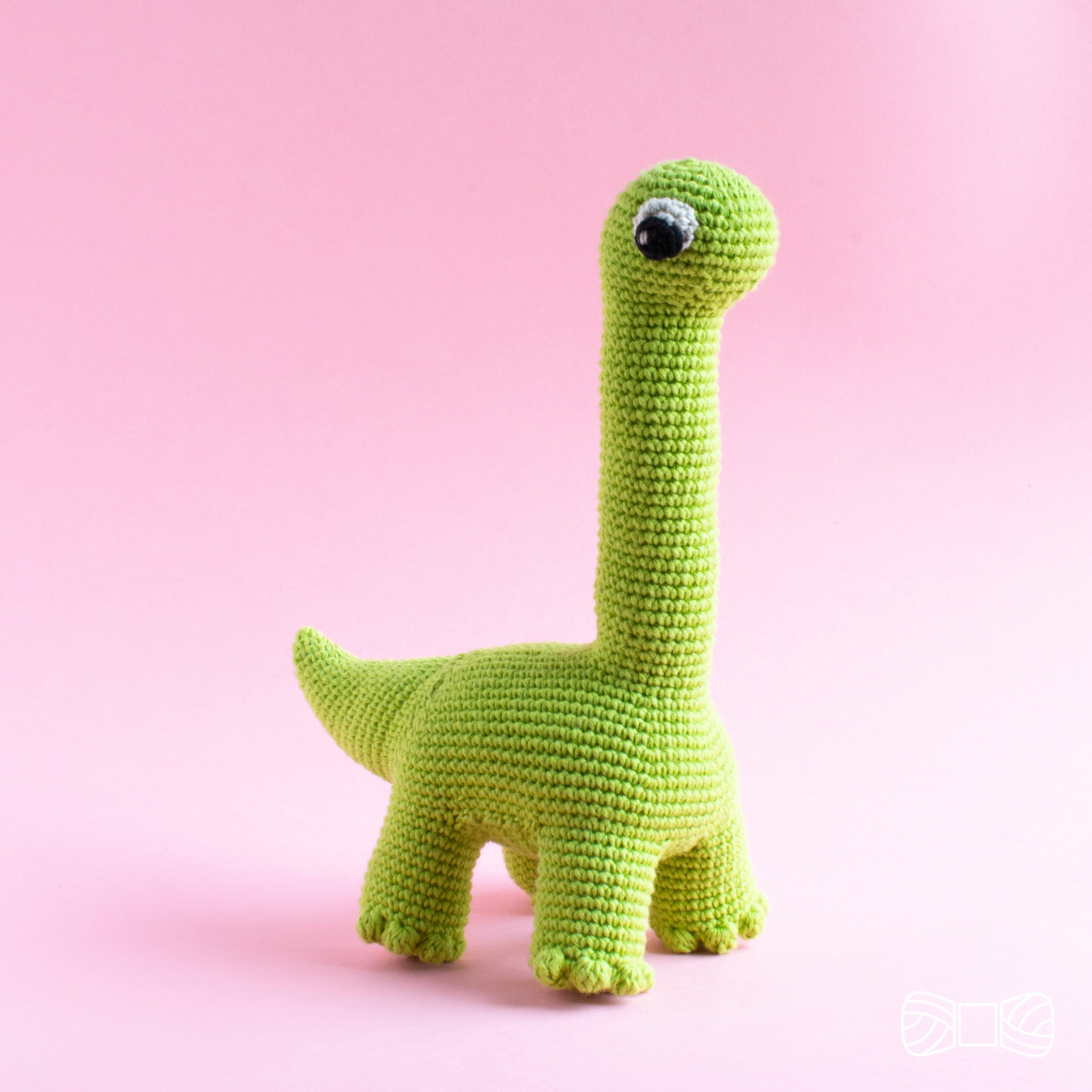 37 Dinosaur Crochet Patterns for Roaring Cute Amigurumi Projects 1 Cute crochet long neck dinosaur toy