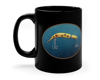 11oz Black Mug. Yellow Fishing Lure.