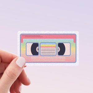 Retro 80s and 90s VHS Tape Holographic Sticker | Retro Rainbow Holographic Glitter Weatherproof Vinyl Sticker by Hello Happy Designs