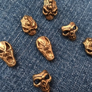 Antique Brass Skull Screw Studs: Decorative Metal Embellishments