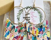 Large size, rainbow confetti leather chevrons linked to a brass ring