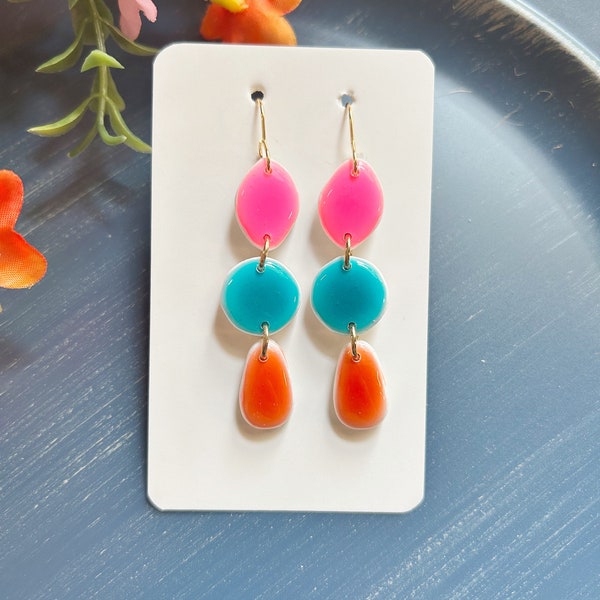 Classic size, resin coated bright ceramic look linked clay earring