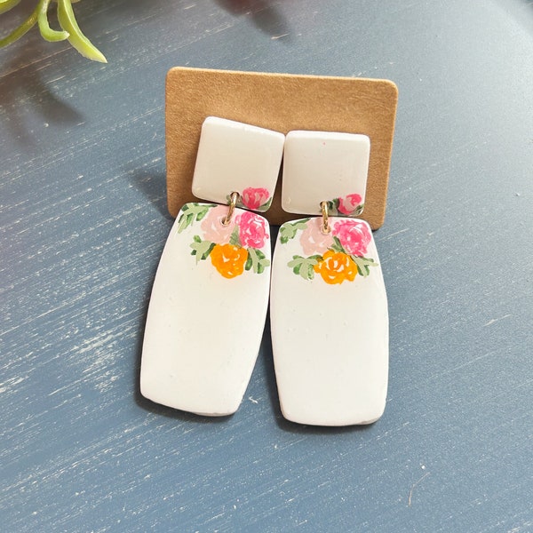 Classic size, white resin coated hand painted floral clay earrings