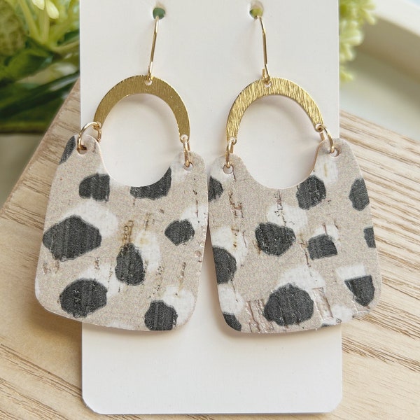 Classic size, neutral dalmation cork on leather  bucket shape earring linked to a brass arch