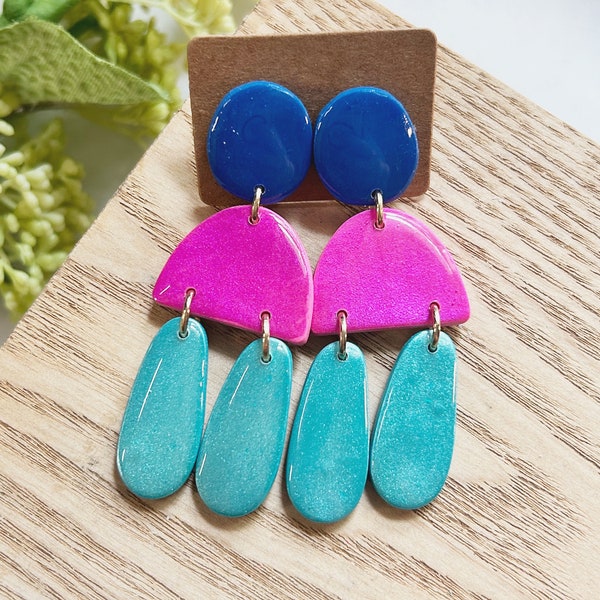 Large size, resin coated shimmery sapphire blue, hot pink and turquoise linked clay earring