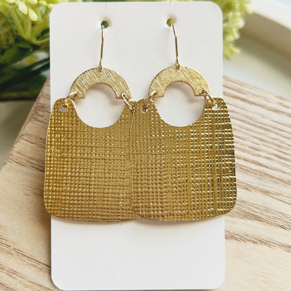 Classic size, gold embossed leather  bucket shape  earring linked to a brass arch