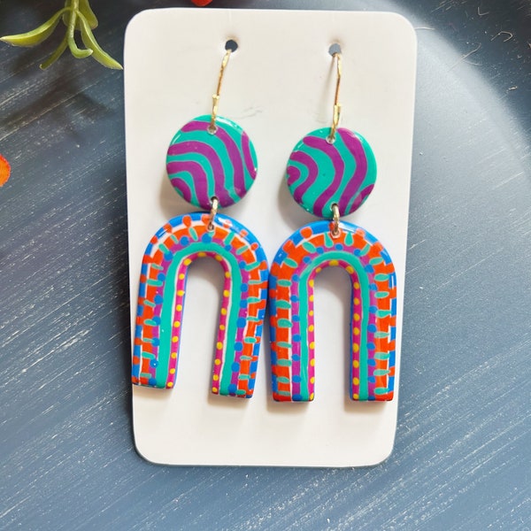 Classic size, resin coated bright colors lines and dots linked arch shape clay earring