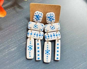 Large size, resin coated hand painted blue and white linked clay earring