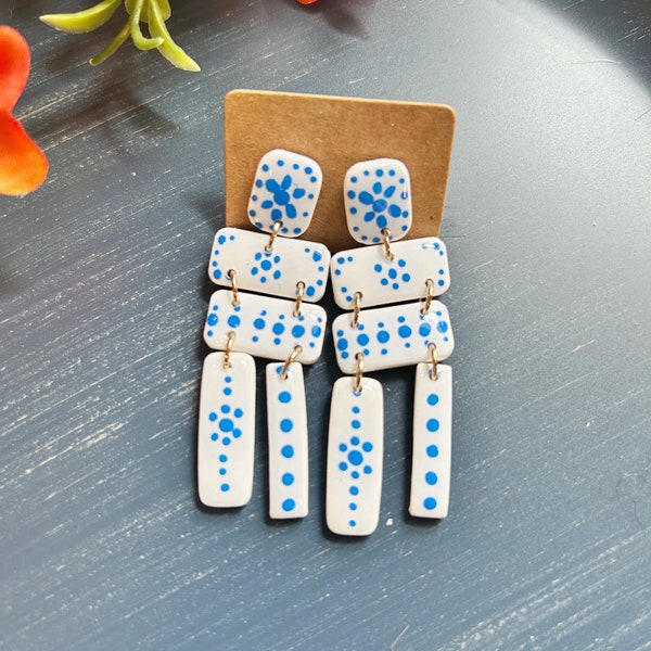 Large size, resin coated hand painted blue and white linked clay earring