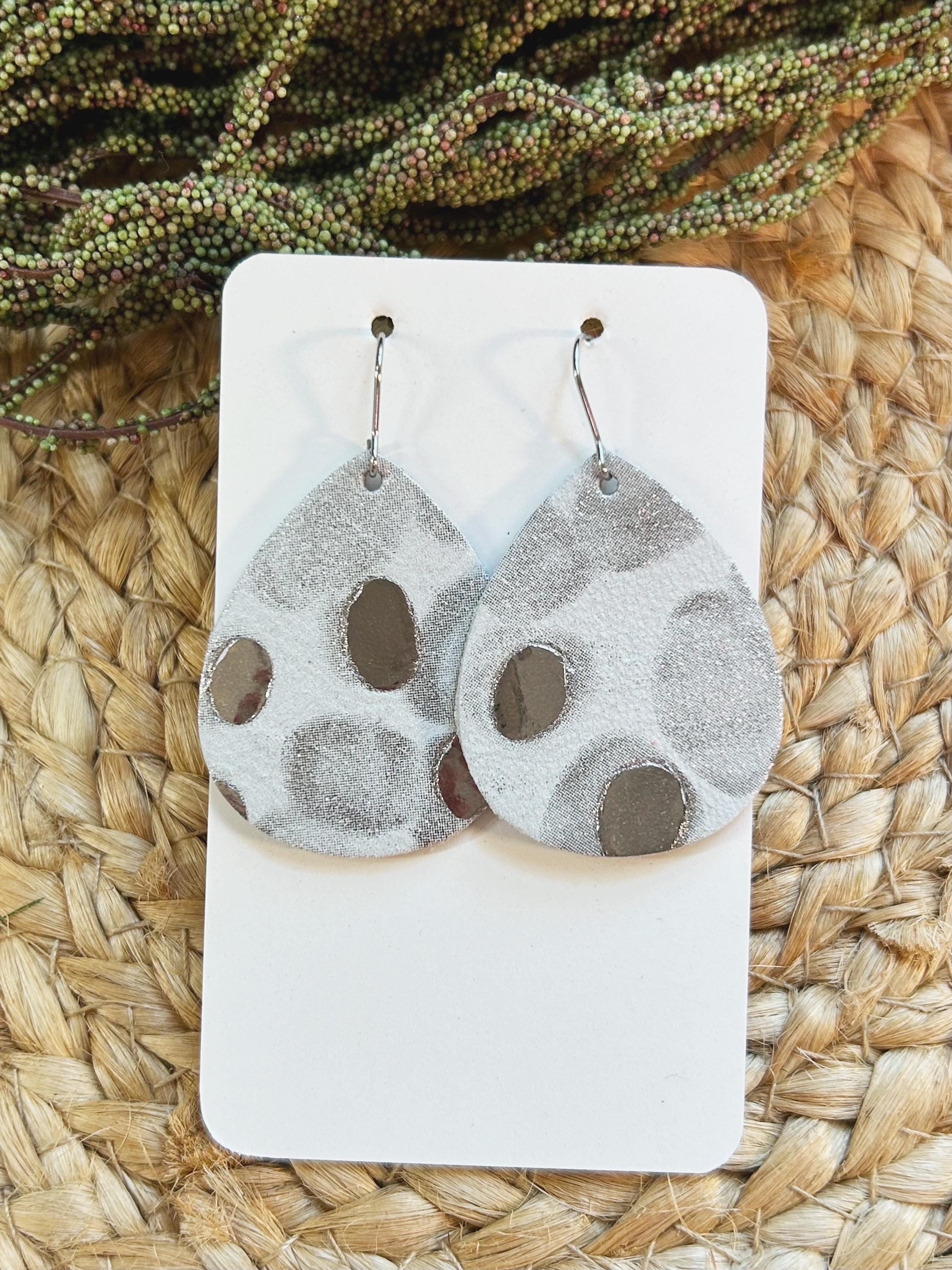 Mini size, dotted metallic silver and white leather teardrop earring