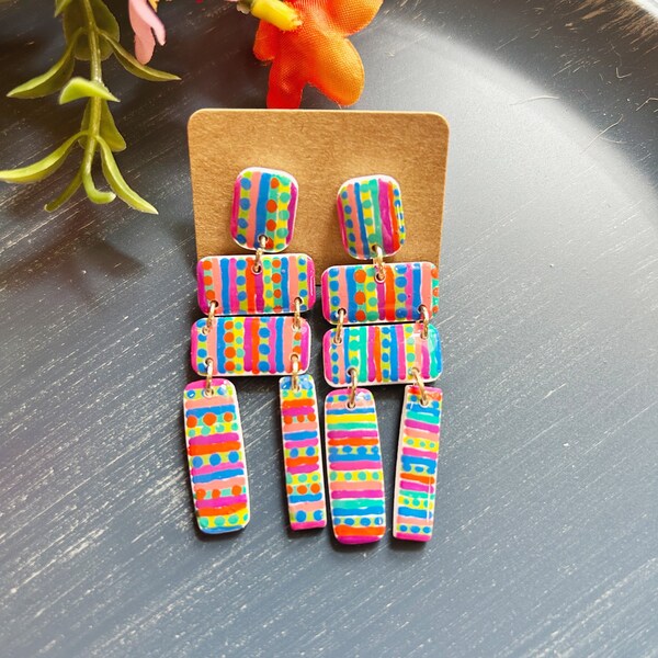 Large size, resin coated bright colors lines and dots linked clay earring