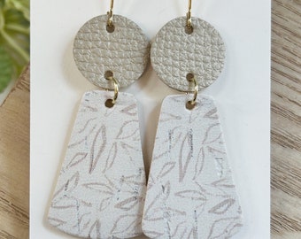 Classic size, neutral leaf print trapezoid shape and champagne shimmer linked leather earring