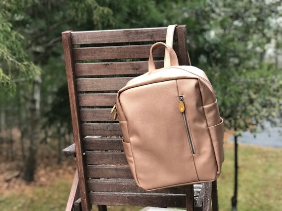 rose gold purse backpack