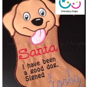 May include: A brown dog-shaped Christmas stocking with the text "Santa I have been a good dog. Signed Scooby" embroidered on it.
