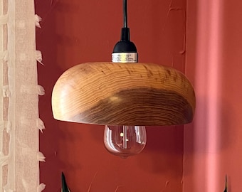 Wood turned shade hanging pendant lamp (plug in).  Recycled hickory.