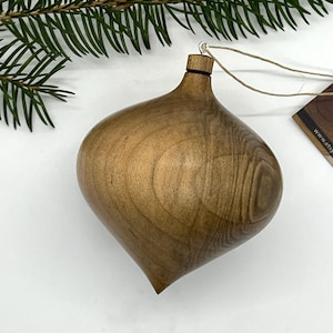Turned wooden Christmas ornament. Recycled maple wood.