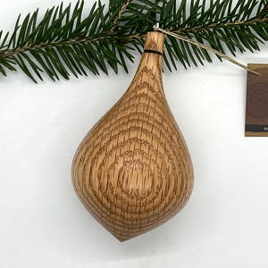 Recycled oak Christmas ornament.