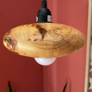 Reading nook wood pendant light.