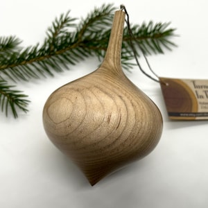Turned wooden Christmas ornament. Recycled maple wood.