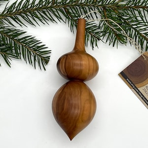 Turned wooden Christmas ornament. Recycled apple wood.
